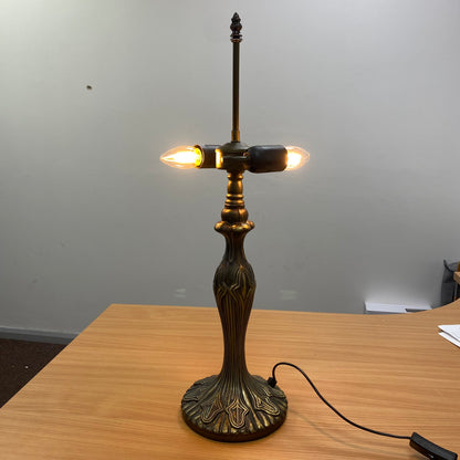 Auroh Tiffany teal and blue dragonfly table lamp in living room setting