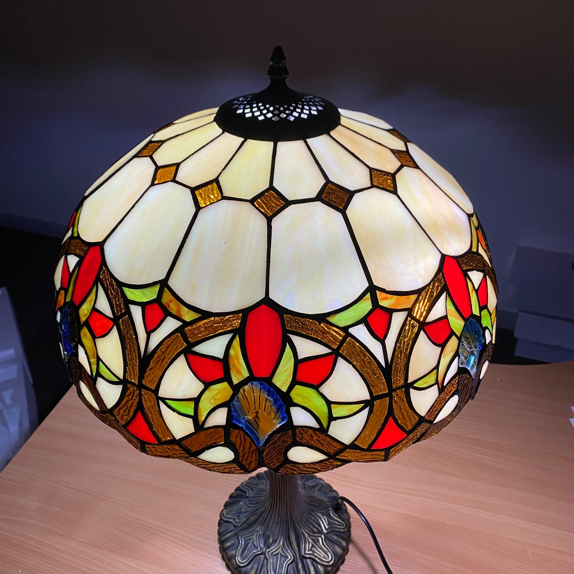 Auroh Tiffany Victorian floral scroll table lamp illuminated showing stained glass colours